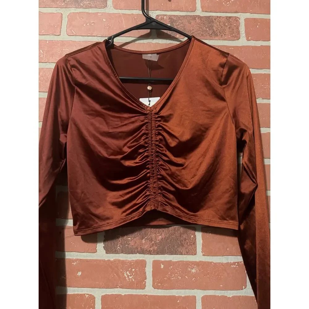 NWT/NWOT Calia long sleeve ruched swim rashguard in a red brown/copper color